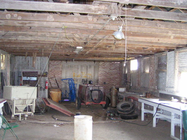 With three chimneys on the roof, this room held three cooking stoves.